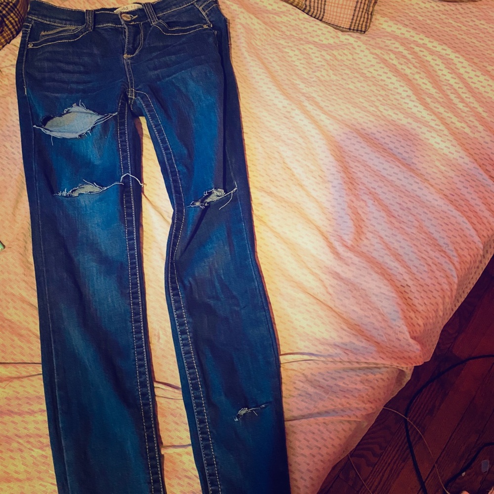 Blue distressed jeans